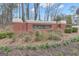 The Kedron Hills brick community sign stands prominently at the neighborhood's entrance at 821 Carnellian Ln, Peachtree City, GA 30269