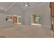 Spacious living room with fireplace and a view of the kitchen and sunroom at 821 Carnellian Ln, Peachtree City, GA 30269