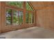 Bright sunroom featuring wood paneled walls and lots of natural light at 821 Carnellian Ln, Peachtree City, GA 30269