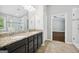 Bathroom with granite countertops, dual sinks, glass-enclosed shower, and tile flooring at 1220 Roswell Manor Cir, Roswell, GA 30076