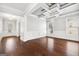 Elegant dining room with decorative tray ceilings and hardwood floors at 1220 Roswell Manor Cir, Roswell, GA 30076