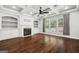 Spacious living room features a fireplace, built-ins, and coffered ceilings at 1220 Roswell Manor Cir, Roswell, GA 30076