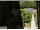An aerial view of a single-Gathering home with a gray roof and lush landscaping at 2504 Plymouth Way, Conyers, GA 30013