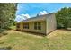 Home exterior with a manicured lawn and well-maintained siding, great curb appeal at 2504 Plymouth Way, Conyers, GA 30013