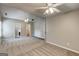 Expansive bedroom with vaulted ceiling, ceiling fans, and access to closet at 2504 Plymouth Way, Conyers, GA 30013