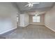 Large bedroom with vaulted ceilings, ceiling fans and neutral carpet at 2504 Plymouth Way, Conyers, GA 30013
