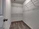 Walk-in closet with carpet and metal shelving at 2504 Plymouth Way, Conyers, GA 30013