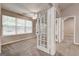 Den offers lots of natural light and decorative glass paneled doors at 2504 Plymouth Way, Conyers, GA 30013