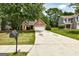 A well-maintained one-story brick home with a two-car garage and a neatly landscaped front yard at 2504 Plymouth Way, Conyers, GA 30013