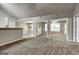Spacious living room showcases open doorway to dining room and den at 2504 Plymouth Way, Conyers, GA 30013