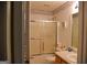 Bathroom featuring a combination tub and shower with sliding doors at 640 Keys Ferry Rd, Mcdonough, GA 30252