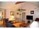 Inviting living room with hardwood floors, vaulted ceiling, and comfortable seating at 640 Keys Ferry Rd, Mcdonough, GA 30252