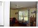 Bright office with a large window and a ceiling fan at 640 Keys Ferry Rd, Mcdonough, GA 30252