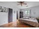 Bedroom featuring wood floors, natural light, and a ceiling fan at 962 Brighton Dr, Lawrenceville, GA 30043