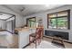 An open kitchen with barstool seating and a sunny window at 962 Brighton Dr, Lawrenceville, GA 30043