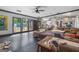 Large living room with view of the pool, skylights and open floor plan at 962 Brighton Dr, Lawrenceville, GA 30043