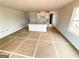 Bright, open kitchen featuring an island and white cabinetry at 11594 E Lovejoy Rd # 1, Hampton, GA 30228