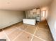 Kitchen with granite counters, white cabinets, and open layout at 11594 E Lovejoy Rd # 1, Hampton, GA 30228