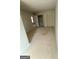 Bedroom showcasing ample closet space and natural light, awaiting your personal touch at 11598 E Lovejoy Rd # 3, Hampton, GA 30228