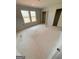 Spacious bedroom with natural light from two windows, and closet space, awaiting your personal touch at 11598 E Lovejoy Rd # 3, Hampton, GA 30228