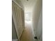 Hallway leading to a room, enhanced by a closet with bi-fold doors, offering extra storage space at 11598 E Lovejoy Rd # 3, Hampton, GA 30228