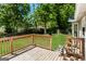 Relax on your deck and enjoy the view of your manicured backyard at 1421 Oak Knoll Ne Dr, Conyers, GA 30012