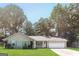 Charming single-story home with a well-manicured lawn and inviting curb appeal at 1421 Oak Knoll Ne Dr, Conyers, GA 30012