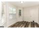 Sunlit corner featuring stylish flooring, neutral walls, and natural light at 1421 Oak Knoll Ne Dr, Conyers, GA 30012