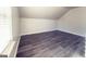 Cozy bedroom with wood floors, neutral walls, and a bright window at 3368 Alhambra Cir, Hampton, GA 30228