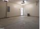 Clean, functional garage space ready for parking, projects, and organizational needs at 3368 Alhambra Cir, Hampton, GA 30228