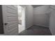 Walk-in closet features a carpeted floor and wire shelving ready for immediate use and organization at 3368 Alhambra Cir, Hampton, GA 30228