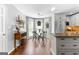 View of a bright eat-in kitchen featuring modern appliances and granite countertops near dining area at 431 Hampton Grn, Peachtree City, GA 30269