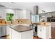 Bright, updated kitchen with stainless steel appliances, granite countertops, and an open layout at 431 Hampton Grn, Peachtree City, GA 30269