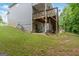 Spacious backyard featuring a patio area under a wooden deck, perfect for outdoor lounging and gatherings at 2307 Loughridge Dr, Buford, GA 30519