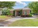Community clubhouse with landscaped grounds, offering a welcoming space for residents to gather at 2307 Loughridge Dr, Buford, GA 30519