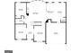 First floor plan featuring a kitchen, living room, dining room, and garage at 2307 Loughridge Dr, Buford, GA 30519