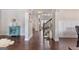 Elegant foyer with hardwood floors, staircase, and neutral decor creating a welcoming entrance at 2307 Loughridge Dr, Buford, GA 30519