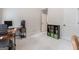 Spacious office setup with computer, desk, shelving, and organized storage containers at 2307 Loughridge Dr, Buford, GA 30519