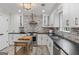 Bright kitchen features modern cabinets, stainless steel appliances, and sleek countertops at 15 Stonewood Way, Sharpsburg, GA 30277