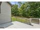 Expansive back deck provides plenty of room for outdoor activities and relaxation with views of the surrounding landscape at 3835 Hickory Branch Trl, Suwanee, GA 30024