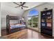 Bedroom features bunk beds, a large window, and hardwood floors at 3835 Hickory Branch Trl, Suwanee, GA 30024