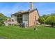 Well-manicured lawn in the backyard complements the house's exterior at 3835 Hickory Branch Trl, Suwanee, GA 30024