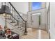 Bright foyer with staircase and large window provides ample natural light at 3835 Hickory Branch Trl, Suwanee, GA 30024