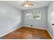 Bedroom with hardwood floors, natural light, and a ceiling fan at 4653 Ridgewood Dr, Forest Park, GA 30297