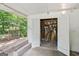 Shed with open doors reveals ample storage and exterior garden views at 4653 Ridgewood Dr, Forest Park, GA 30297