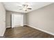 Bright bedroom featuring ceiling fan and closet at 2835 Laguna Dr, Decatur, GA 30032