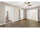 Bedroom featuring open closet and ceiling fan at 2835 Laguna Dr, Decatur, GA 30032