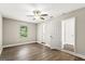 Cozy bedroom with natural light, ceiling fan and open closet at 2835 Laguna Dr, Decatur, GA 30032