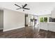 Open-concept living space with modern ceiling fan and a seamless flow to the kitchen at 2835 Laguna Dr, Decatur, GA 30032