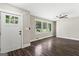 Bright and airy living room with large windows and modern ceiling fan at 2835 Laguna Dr, Decatur, GA 30032